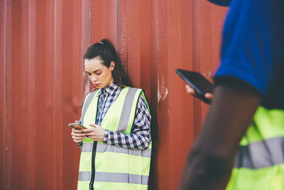 Young woman using mobile phone