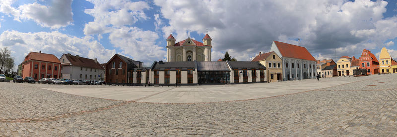 Buildings in city against sky