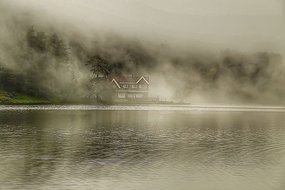 View of lake in foggy weather