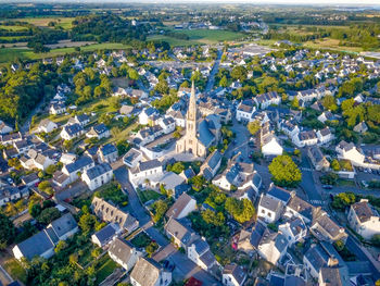 High angle view of trees and houses