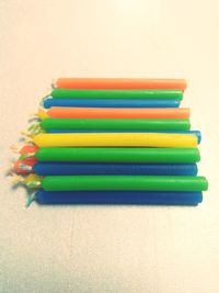 Close-up of multi colored pencils on table