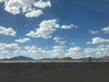 Scenic view of desert against sky