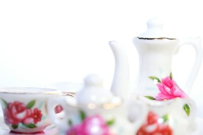 Close-up of crockery against white background