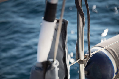 Close-up of sailboat details while sailing on sea