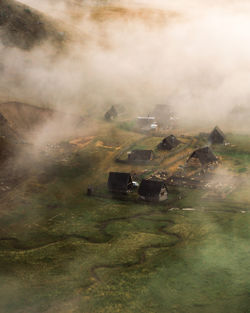 Aerial view of village in fog