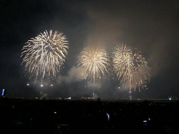 Firework display at night