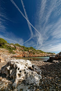 Scenic view of vapor trails in sky