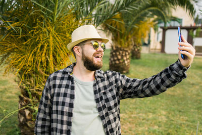 Young man using mobile phone