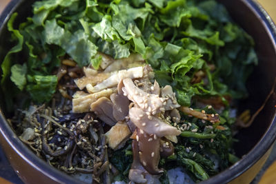 Close-up of meat and salad in bowl