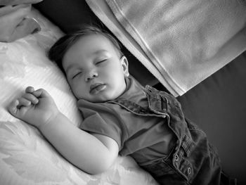 Cute baby sleeping on bed