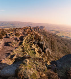 Scenic view of rock formations against sky