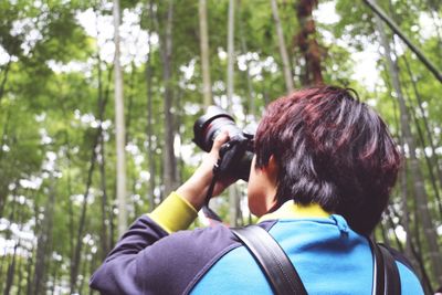 Man photographing with camera