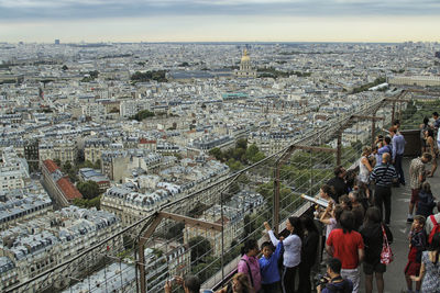 High angle view of people on staircase in city