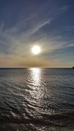 Scenic view of sea against sky at sunset