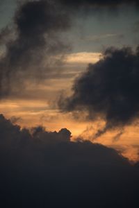 Low angle view of cloudy sky during sunset