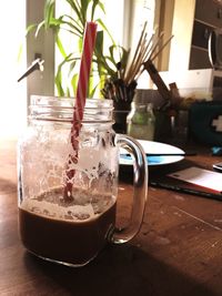 Close-up of drink in jar on table