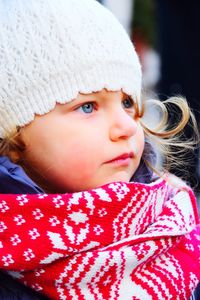 Close-up of cute baby girl wearing warm clothes