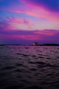 Scenic view of sea against sky at sunset