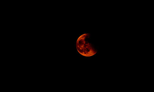 Scenic view of moon against sky at night