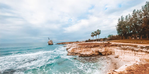 Scenic view of beach against sky