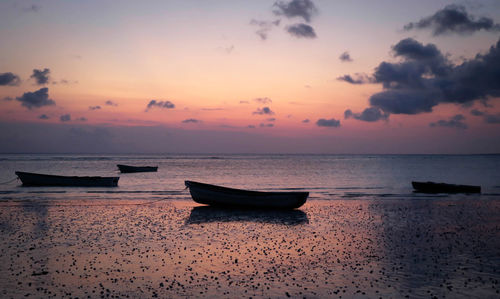 Scenic view of sea at sunset