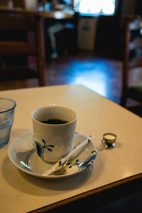 Coffee cup on table