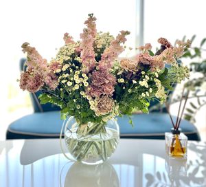 Flowers in vase on table