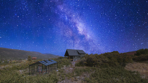 Scenic view of star field against sky at night