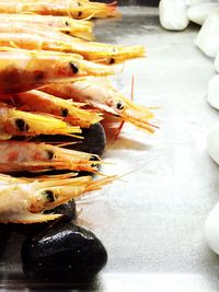 Close-up of prawns on table