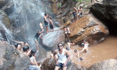 People standing on rocks