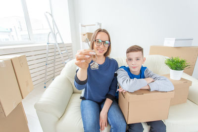 Portrait of happy friends in box