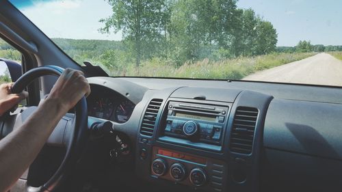 Close-up of hand holding car