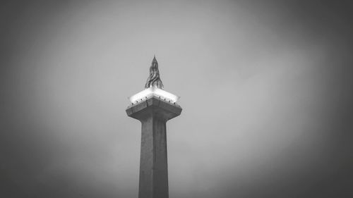 Low angle view of tower against sky