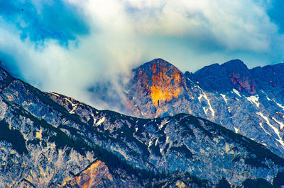 Close-up of volcanic mountain against sky