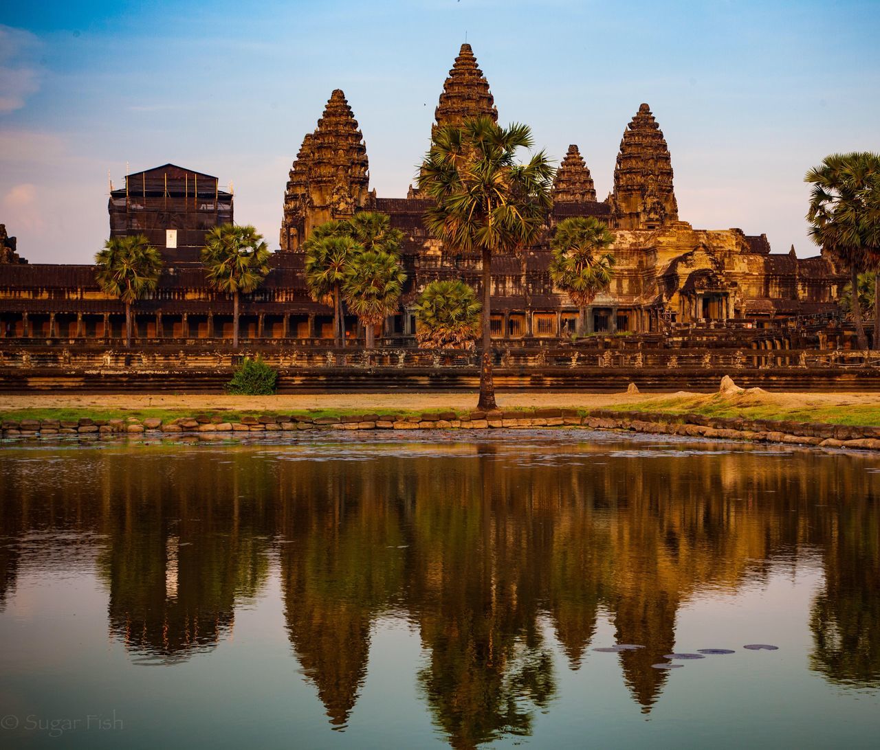 reflection, water, architecture, built structure, building exterior, waterfront, lake, history, place of worship, religion, famous place, pond, sky, travel destinations, river, spirituality, standing water, travel, tourism, temple - building