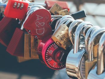 Close-up of padlocks hanging on metal