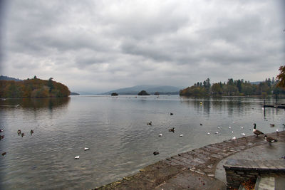 View of lake against cloudy sky