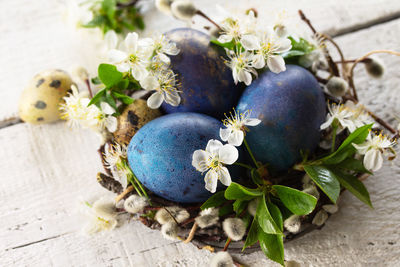 Close-up of blue flower pot on table