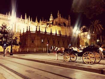 Bicycles on street in city at night