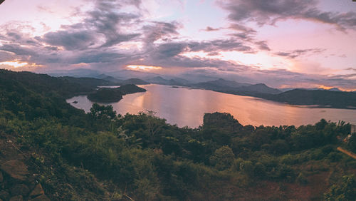 Scenic view of mountains against sky at sunset