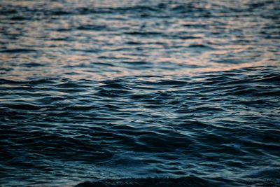 Full frame shot of water in sea during sunrise