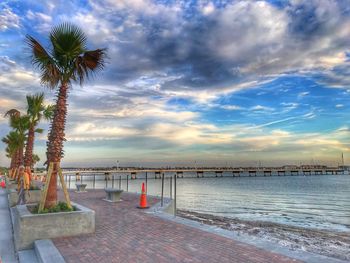 Scenic view of sea against sky at sunset