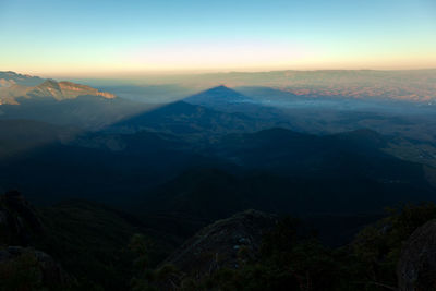 Scenic view of mountains against sky during sunset