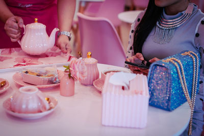 Midsection of woman preparing food