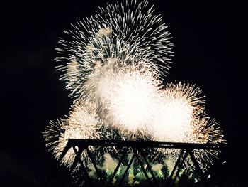 Close-up of firework display at night