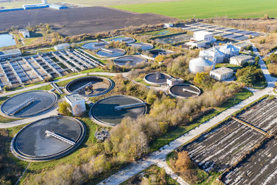 High angle view of sewage plant on road in city