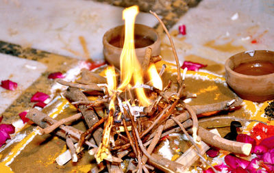 High angle view of burning candles