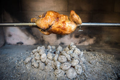 Close-up of meat on barbecue grill