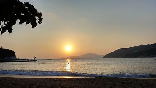 Scenic view of sea at sunset