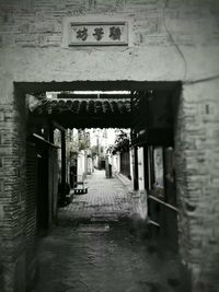 Narrow alley along buildings